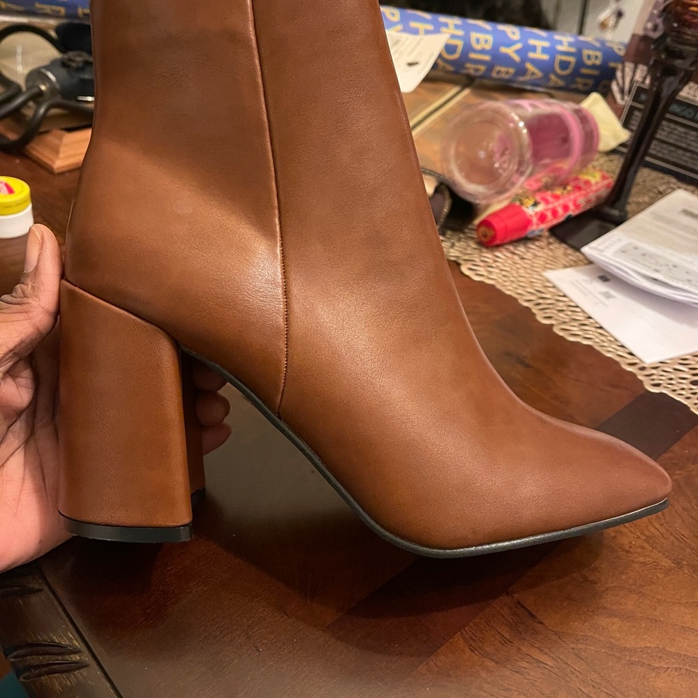 Brown cute booties. Sized 11 fit more like narrow 10.